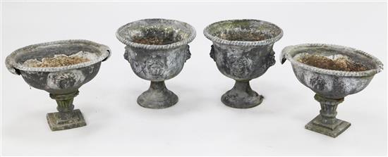 A pair of lead garden urns, urns W.1ft